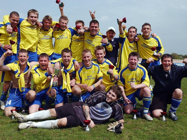 AFC Dynamo celebrate victory in the 2005 Gosport and Fareham League's Fareham Town Supporters' Cup Final.