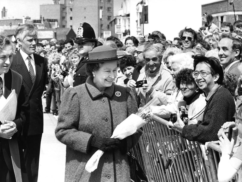 The Queen goes walkabout to meet some of the spectators gathered outside the Square Tower, Old Portsmouth in 1987. The News PP5458