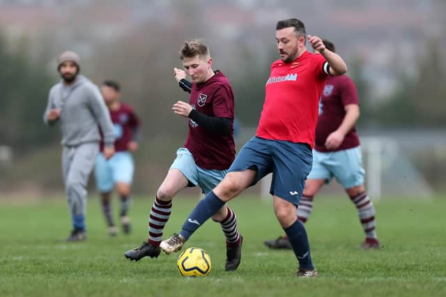 Barry Jeans (maroon) was on target as Meon Milton defeated FC Strawberry 3-1 in the Mid-Solent League. Picture: Chris Moorhouse