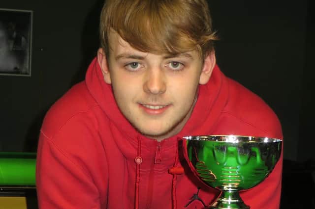 Jamie Wilson with his Cuestars trophy