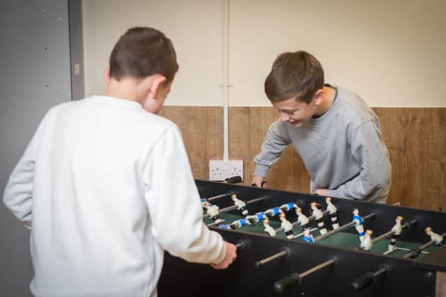 Group of residents have opened The Box at Portchester Football Club - a place for young people to socialise after school.

Pictured:  Oliver and Charlie 13 playing table-top football at /the Box.

Picture: Habibur Rahman