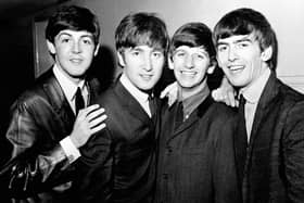 The Beatles in 1963, (left to right), Paul McCartney, John Lennon, Ringo Starr and George Harrison as their historic touchdown at JFK Airport in New York. Photo PA Wire