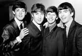 The Beatles in 1963, (left to right), Paul McCartney, John Lennon, Ringo Starr and George Harrison as their historic touchdown at JFK Airport in New York. Photo PA Wire