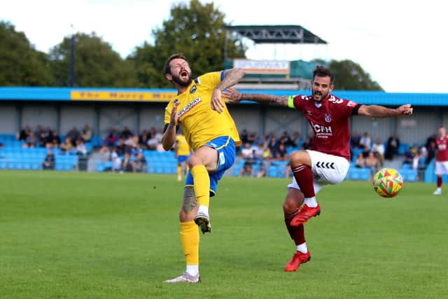 Dan Wooden in FA  Cup action against Paulton Rovers. Picture by Tom Phillips