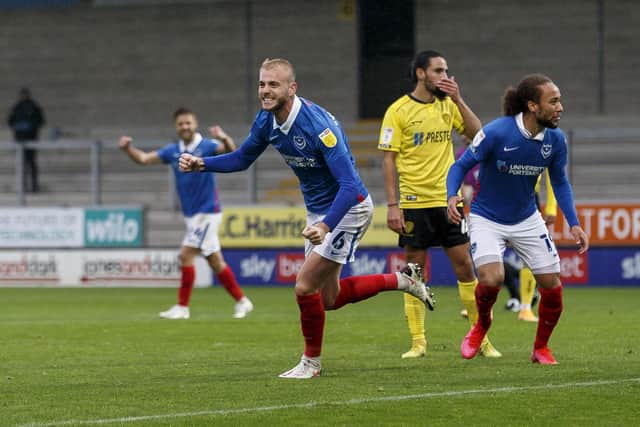 Jack Whatmough of Portsmouth celebrates after scoring their third goal to make the score 2-3 during the Sky Bet League One match between Burton Albion and Portsmouth at Pirelli Stadium on October 3rd 2020 in Burton, England. (Photo by Daniel Chesterton/phcimages.com)