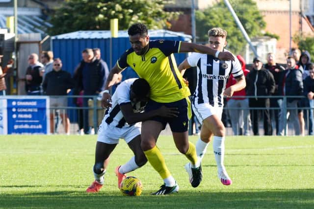 Jordan Rose is held back during Gosport's 4-0 trouncing of Farnborough. Picture: Tom Phillips