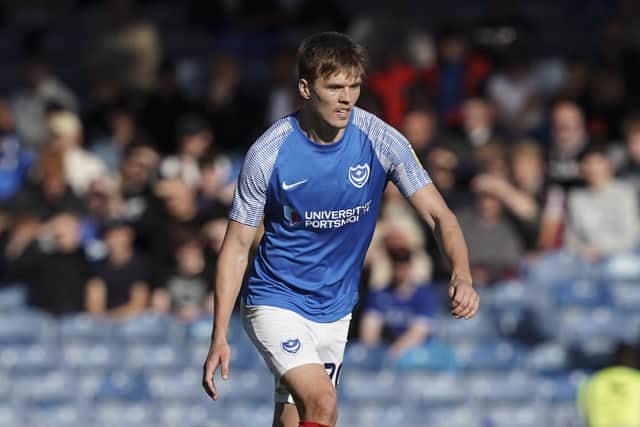 Sean Raggett has come to the aid Michael Morrison and Clark Robertson after Pompey's defence was questioned by fans following their 1-1 draw against Fleetwood.