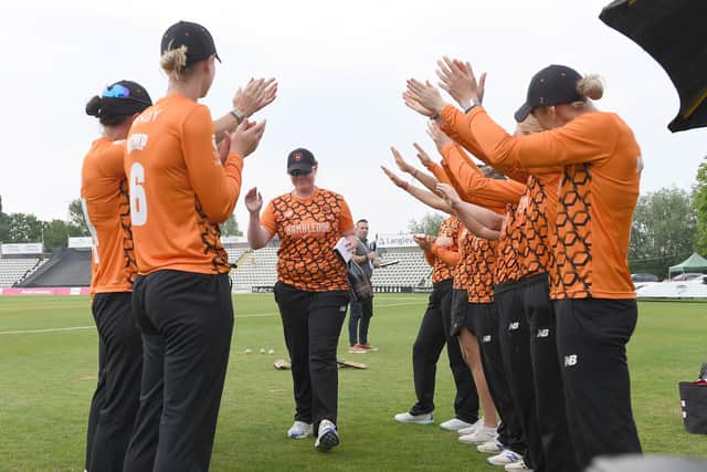 Anya Shrubsole of Southern Vipers is applauded by her team-mates on being announced the Player of the Match in the Charlotte Edwards Cup final. Picture by Tony Marshall/Getty Images