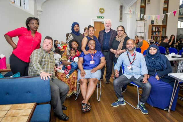 Chairman of Friends Without Borders, Michael Woolley and volunteers with some of the asylum seekers and refugees in All Saints Church, Portsmouth, in 2019.
Picture: Habibur Rahman