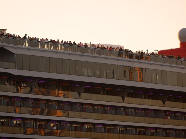Pictured is: Passengers on the MV Resilient Lady wave back
Picture: Keith Woodland (140921-39)
