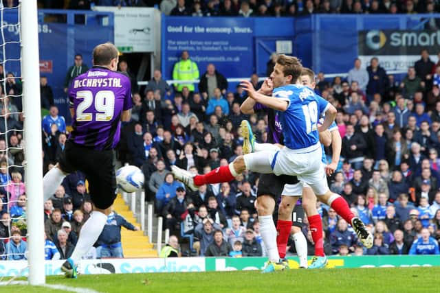 Wes Fogden pokes home Pompey's winner against Bristol Rovers in April 2014. His maiden Blues goal secured a priceless three points in the battle against relegation. Picture: Joe Pepler