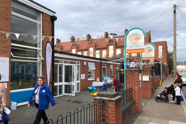 Children arrive at New Horizons Primary in North End on Friday morning. Picture: Richard Lemmer