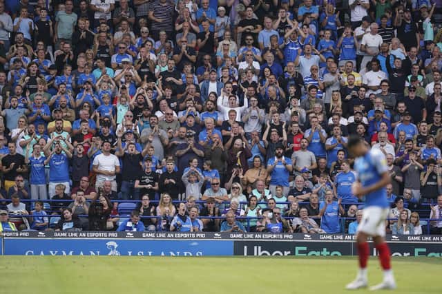 The Fratton faithful join Dane Scarlett in celebrations after netting against Peterborough. Picture: Jason Brown/ProSportsImages