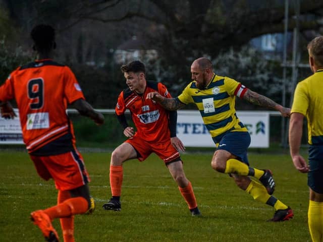 Paulsgrove's Aaron Fennemore, right, in action during the 2-2 friendly draw at AFC Portchester. Picture: Daniel Haswell.