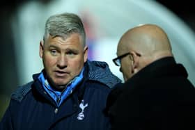 Nigel Gibbs, left, has been drafted in to help Pompey in Kenny Jackett's absence.  Picture: Richard Heathcote/Getty Images