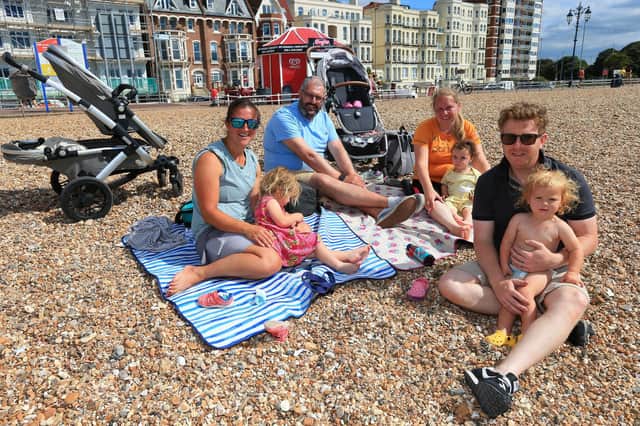 The Prankerd and Tunnicliffe families enjoying the hot weather on Southsea seafront. Picture: Chris Moorhouse (jpns 090722-01)