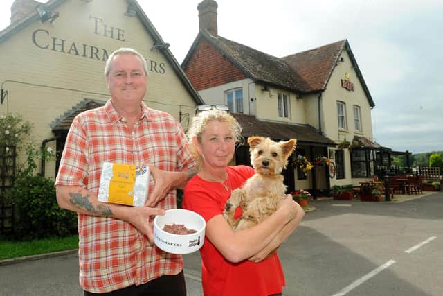 Landlords of The Chairmakers Angus and Sherry Reid with their dog Toffee. Picture: Sarah Standing
