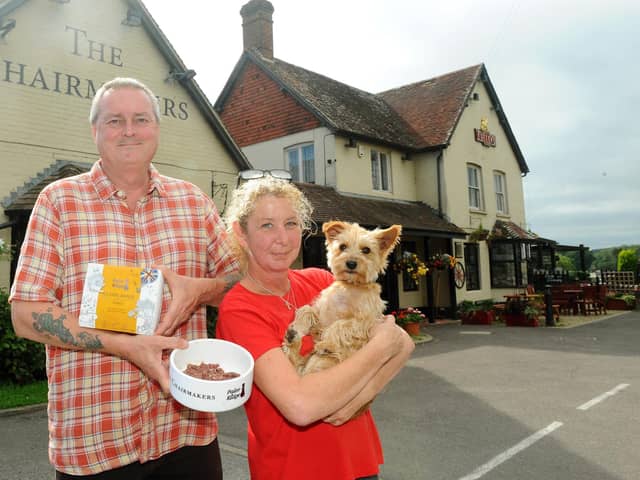 Landlords of The Chairmakers Angus and Sherry Reid with their dog Toffee. Picture: Sarah Standing