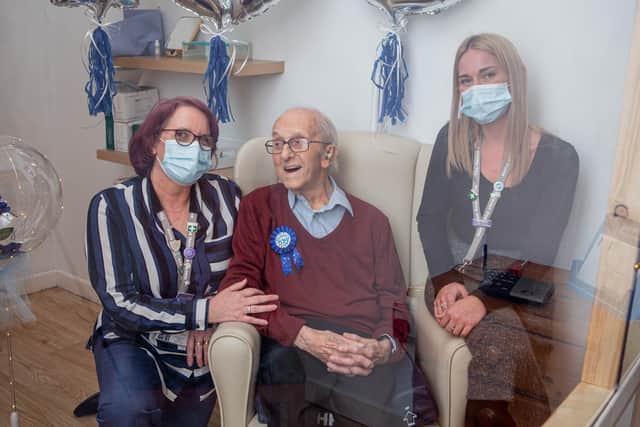 Bob Phillips with the care home managers, Amy Hall and Ann Roberts in a Visiting Pod at The Haven care home, Drayton, Portsmouth on 17 March 2021.

Picture: Habibur Rahman