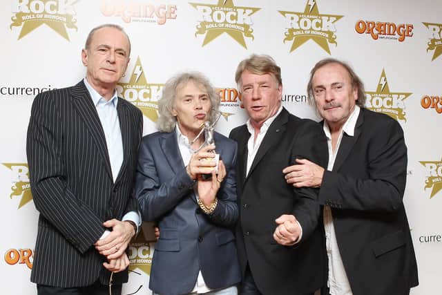 John Coghlan, pictured on the right alongside Francis Rossi, Alan Lancaster, Rick Parfitt at the Classic Rock Roll of Honour awards at The Roundhouse in London on November 13, 2012, is set to perform a farewell tour in Portsmouth. Photo by Jo Hale/Getty Images.