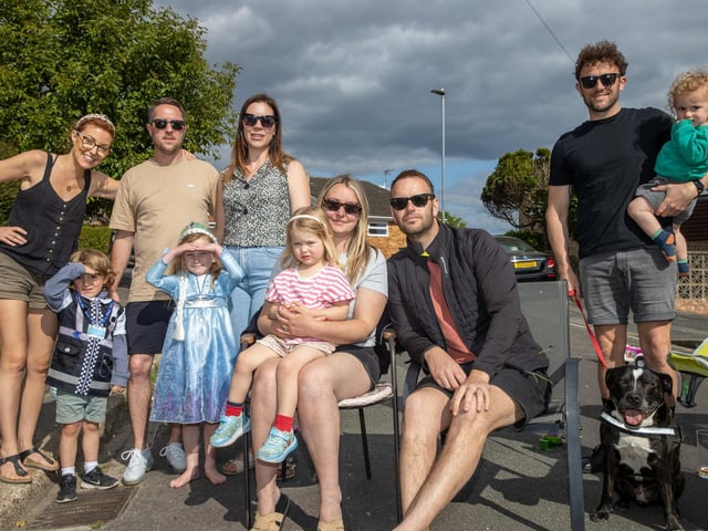 The Berry family and friends from Woodfield Avenue in Drayton gather for a VE Day street party.  Photos by Alex Shute