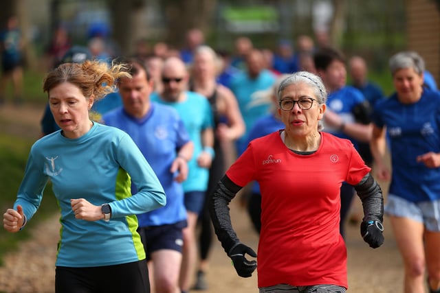 Zoe Gill, left, was the second woman finisher in the 500th Havant parkrun at Staunton Country Park. Picture: Chris Moorhouse (jpns 220423-009)