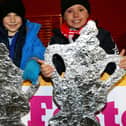 Magic of the (tinfoil) FA Cup - Salford City fans with their home-made trophies. Photo by Alex Livesey/Getty Images.