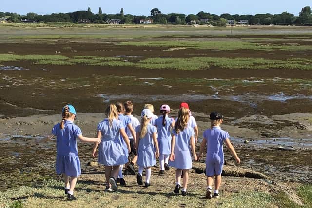 Mill Rythe Infant School's Year 2 bubble enjoy a walk to the sea to help with their mental well being.