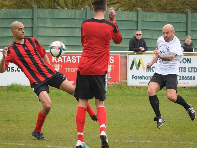 Action from the Jon Gittens memorial charity match between a team of former Fareham Town players and a side of ex-Pompey and Southampton professionals. Picture: Keith Woodland (160421-663)