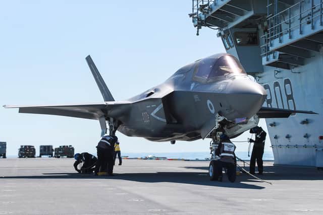 A F-35B being tended to by naval aircrew on HMS Queen Elizabeth. Photo: Royal Navy