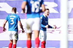 Ronan Curtis celebrates scoring Pompey's second goal against Rochdale. Picture: Joe Pepler