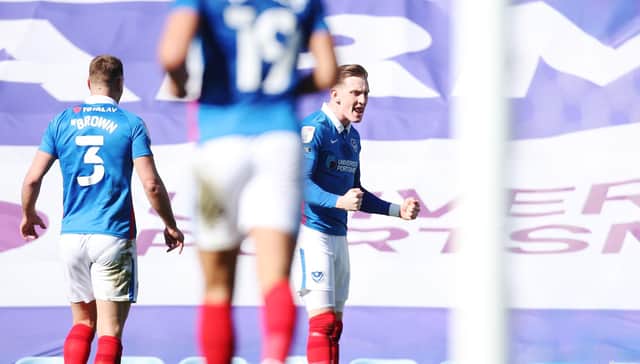 Ronan Curtis celebrates scoring Pompey's second goal against Rochdale. Picture: Joe Pepler