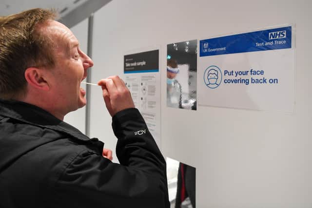 A lateral flow test being taken in the Guildhall centre in Portsmouth. (Photo by Finnbarr Webster/Getty Images)