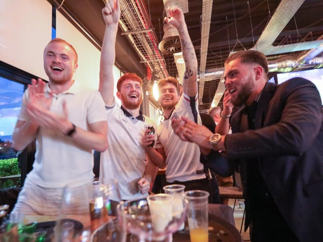 Celebrations at full-time. Fans watch Netherlands v England, UEFA Euros 2024 semi-final played in Dortmund, at Village Hotel, Lakeshore Drive, CoshamPicture: Chris  Moorhouse (100724-094)