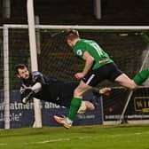 Glenavon goalkeeper Rory Brown pulls off a save to deny reported Pompey target Terry Devlin.