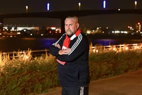Perry McMillian by Itchen Bridge, Southampton, where the bridge is lit by blue lighting