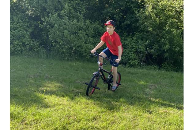 Jacob-Kanu Smith on his new bicycle. Picture: Hayley Smith