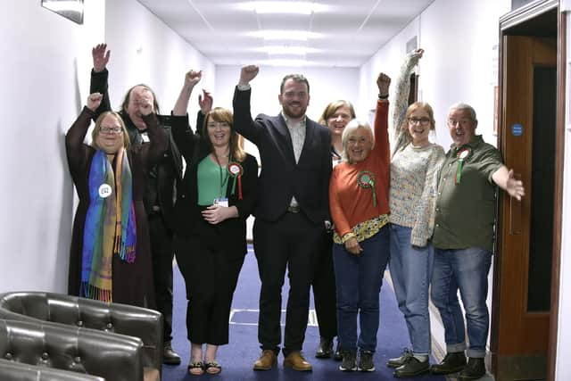 Cal Corkery, in the middle, was elected as an independent councillor for Charles Dickens ward and is pictured with his supporters.
Picture: Sarah Standing (040523-2312)