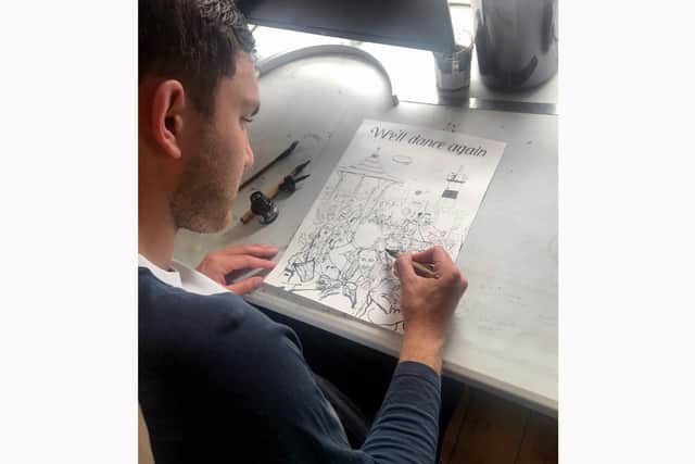Joe Munro creating his artwork for the project.