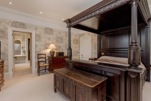 Cowden House boasts five bedrooms in the main house, with the master bedroom furniture and wallpaper designed by Clive Christian. The en-suite bathroom has a double bath and is fitted with a TV.