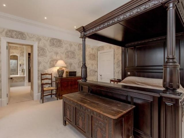 Cowden House boasts five bedrooms in the main house, with the master bedroom furniture and wallpaper designed by Clive Christian. The en-suite bathroom has a double bath and is fitted with a TV.