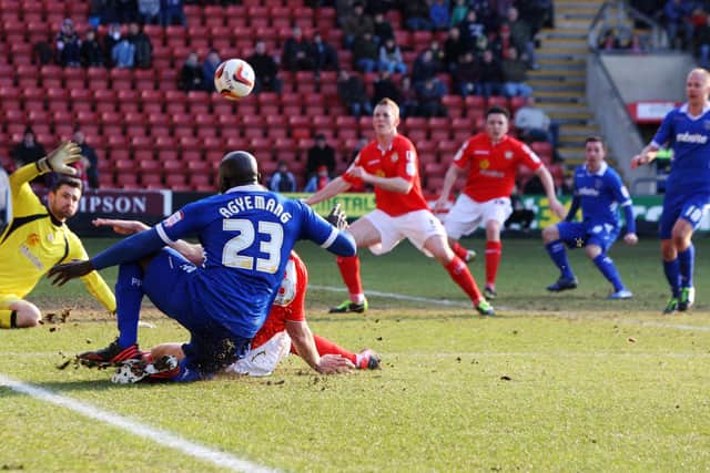 Patrick Agyemang crosses for David Connolly to score in Pompey's 2-1 win at Crewe in March 2013. It ended 23 matches without victory. Picture: Joe Pepler