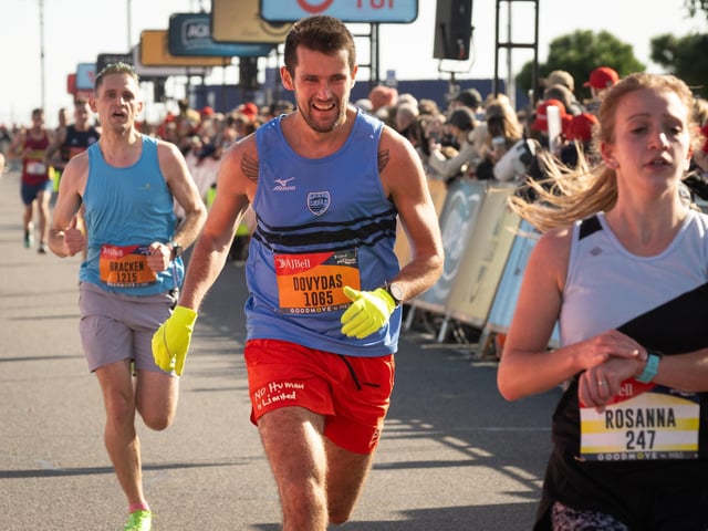 Pictured is: Runners cross the line to finishPicture: Keith Woodland (151021-586)