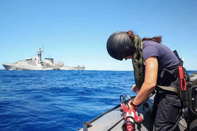 L(AWW) Dickinson conducting water sampling in the Pitcairn waters, South Pacific Picture: LPhot Unaisi Luke