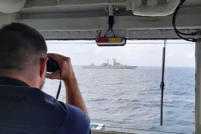 HMS Westminster maintaining a vigilant watch on RFN Cruiser Marshal Ustinov.