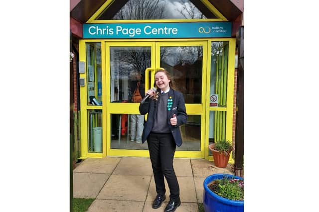 Nevaeh performing outside The Chris Page Centre. 