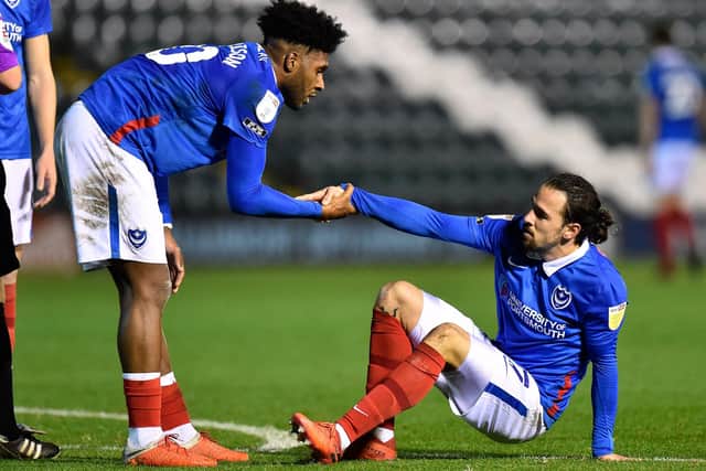 Ryan Williams, right, gets help from team-mate Ellis Harrison at Plymouth. PictureL Graham Hunt