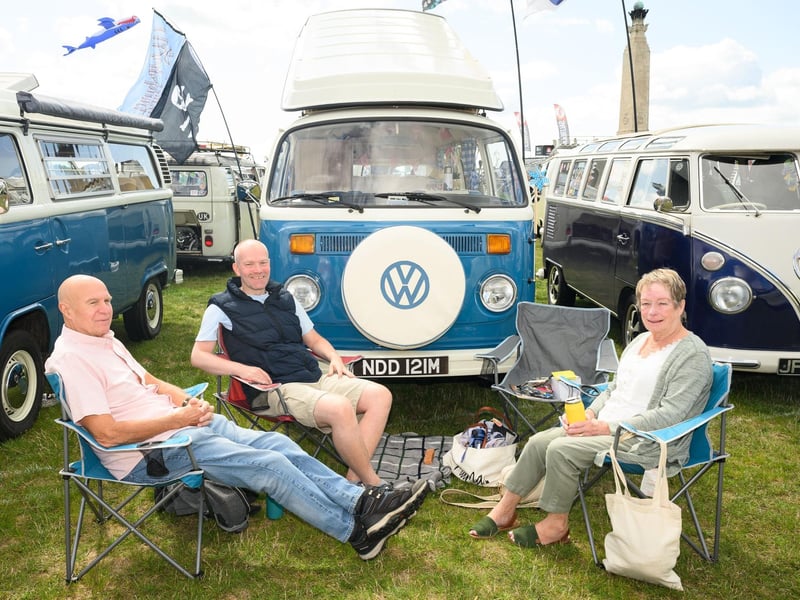 Pictured is: Brian, Michael and Leslie from London relax by their camper
Picture: Keith Woodland (060821-133)