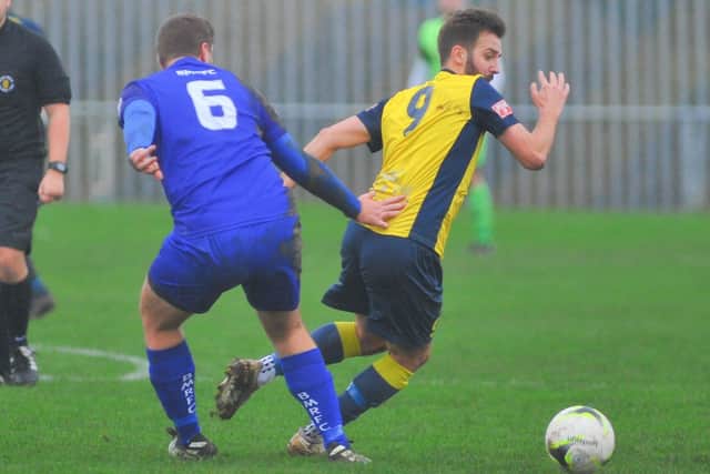 Baffins defender Ed Sanders, left, and Moneyfields' Dec Seiden. Picture: Martyn White