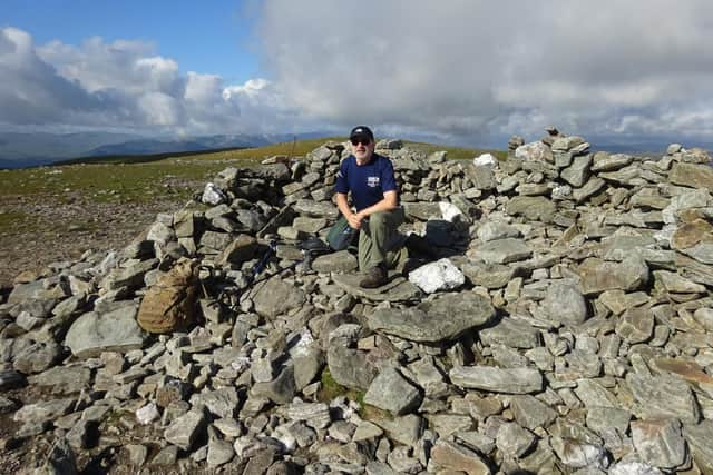 Rob Moriarty at the summit of Ben Chonzie